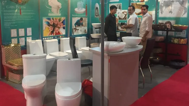 YIDA booth at 2017 Iran Expo, featuring golden art basins and modern ceramic toilets for Middle Eastern clients