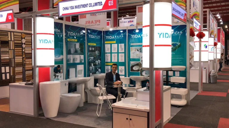 YIDA booth at 2018 South Africa Construction Expo, featuring modern ceramic toilets and basin displays with Chinese red lanterns