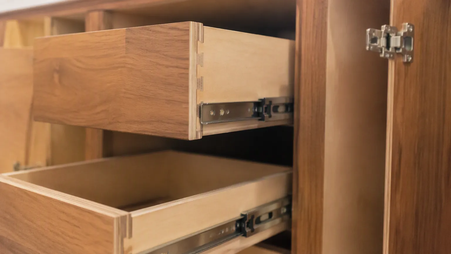 plywood vanity cabinet interior with dovetail joinery and drawer slides